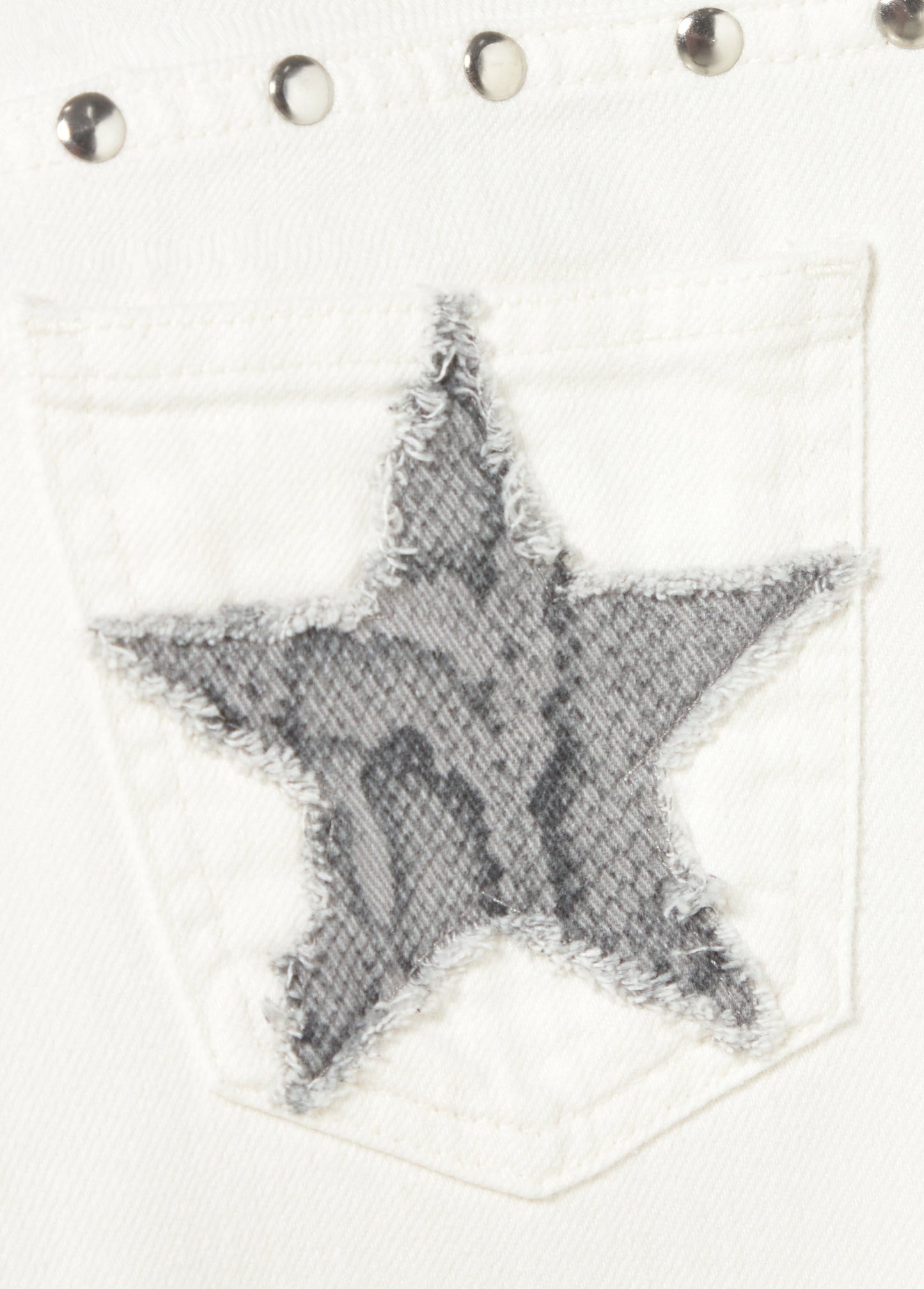 Pantalón tiro bajo estrellas glitter y tachas