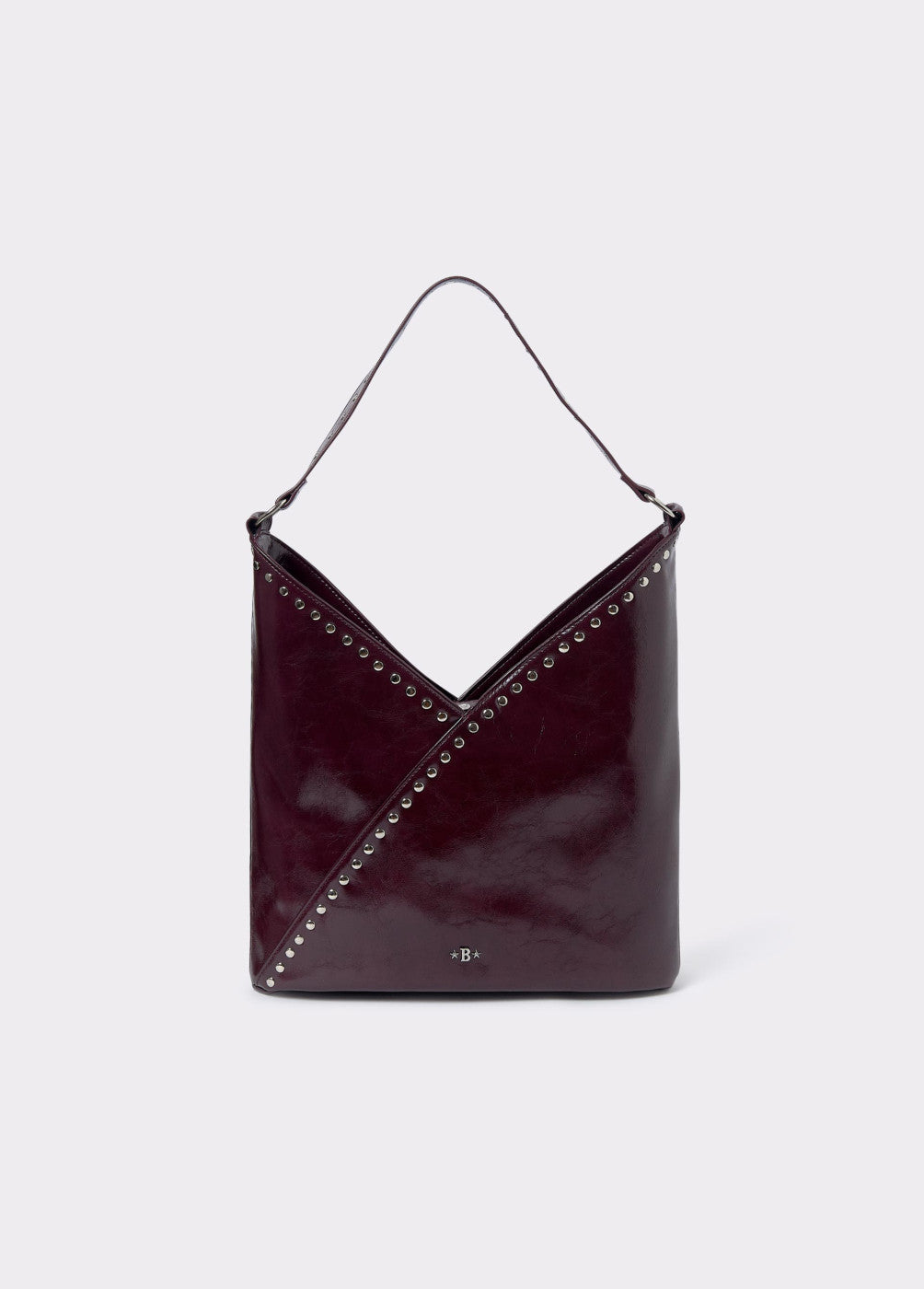 Bolso hombro tachitas