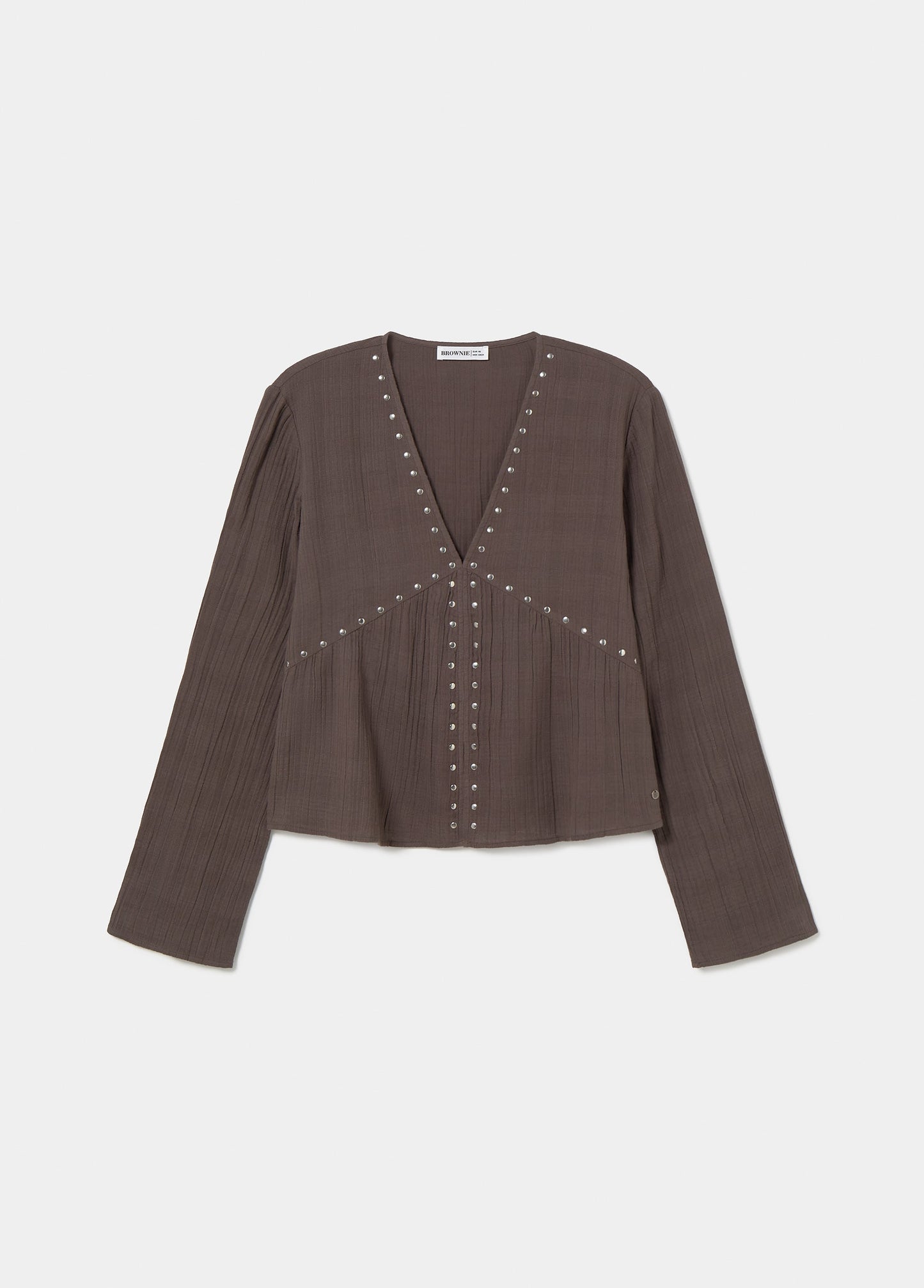 Blusa pico tachas manga larga