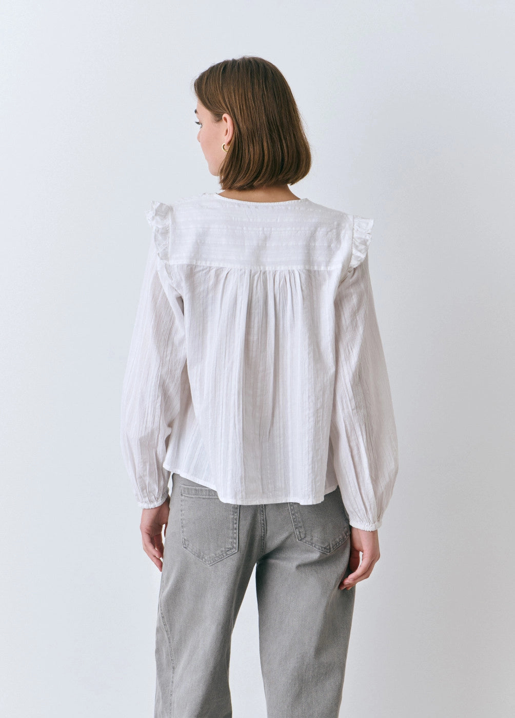 Blusa detalle volante