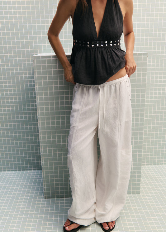 Pantalón bombacho lino detalle tachas