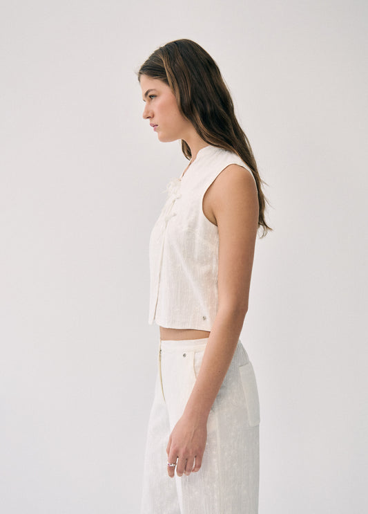 Chaleco bordado nudos