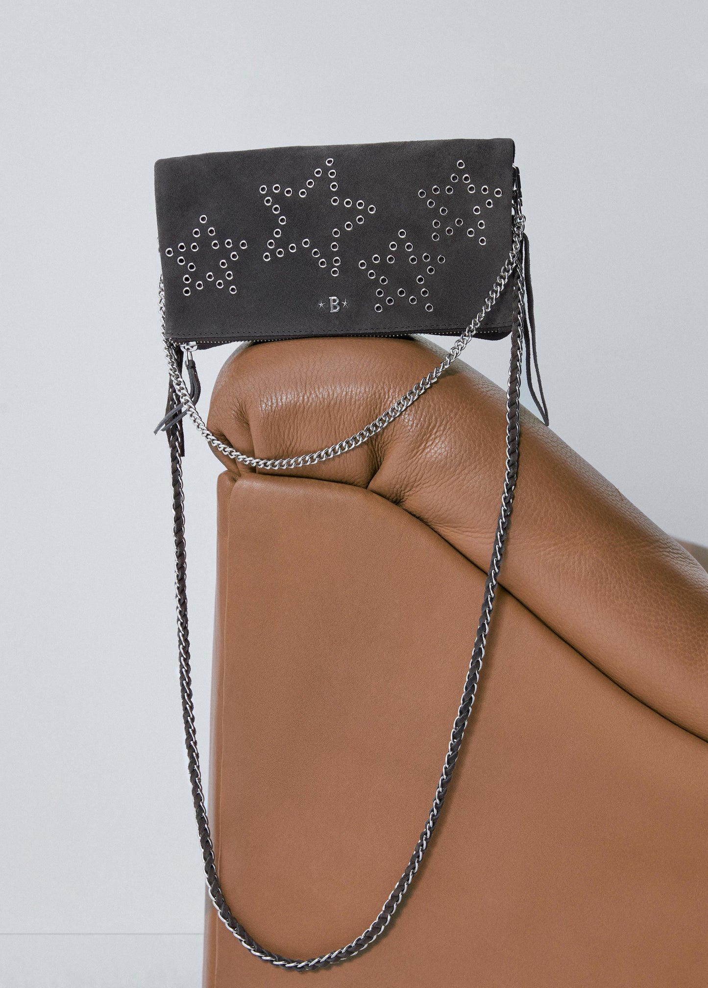 Bolso solapa eyelets estrellas