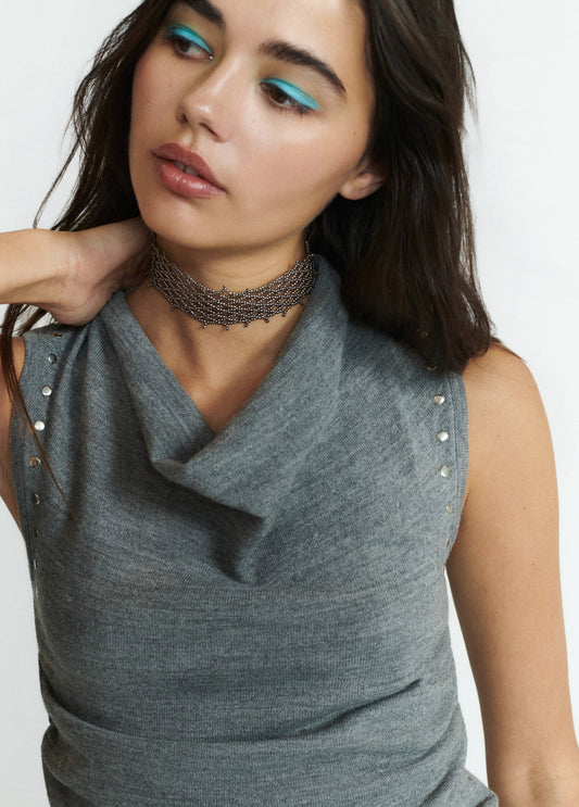 Top frunce tachas