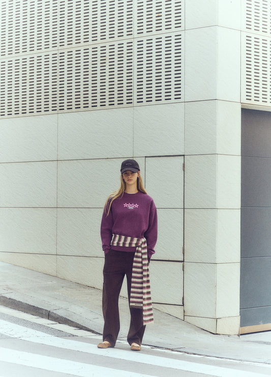 Sudadera print estrellas tachas