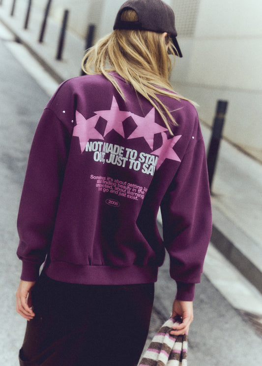 Sudadera print estrellas tachas
