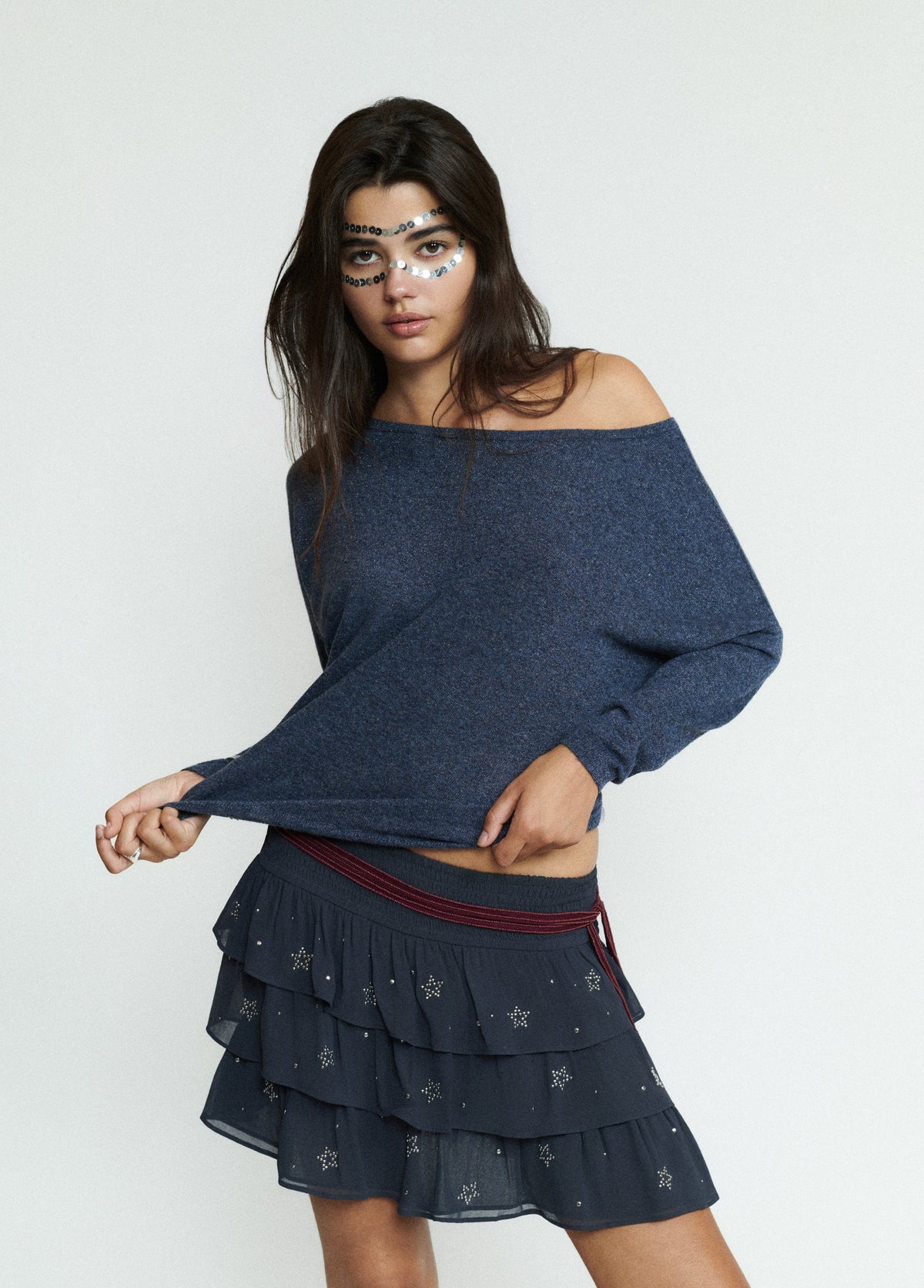 Falda corta multivolantes tachas