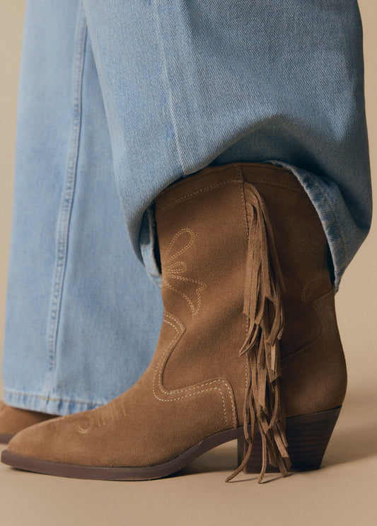 Botín cowboy flecos cuero