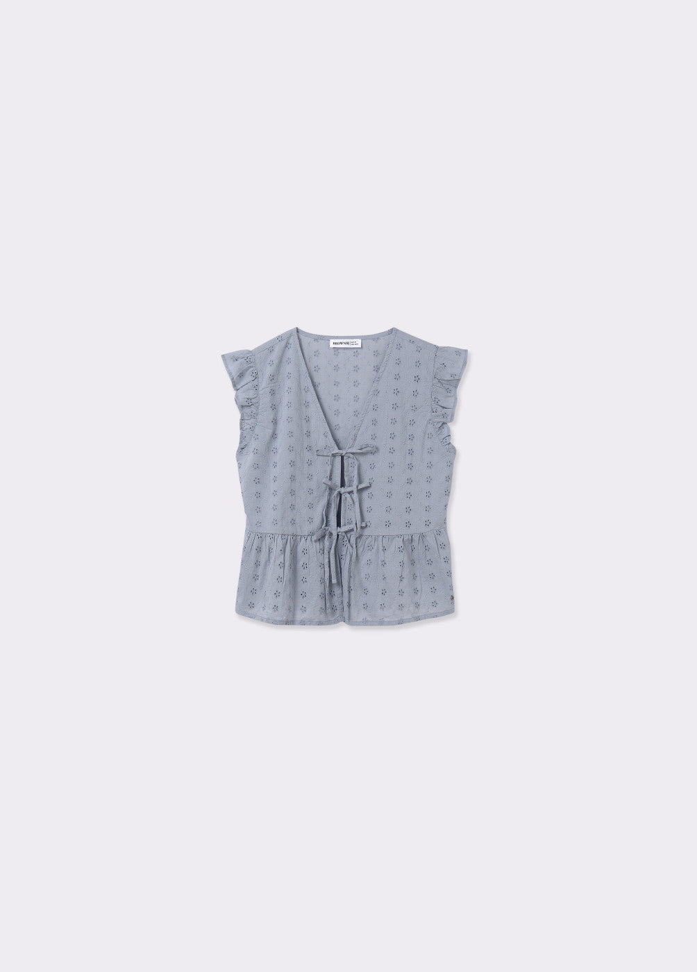 Blusa sin mangas con lazos
