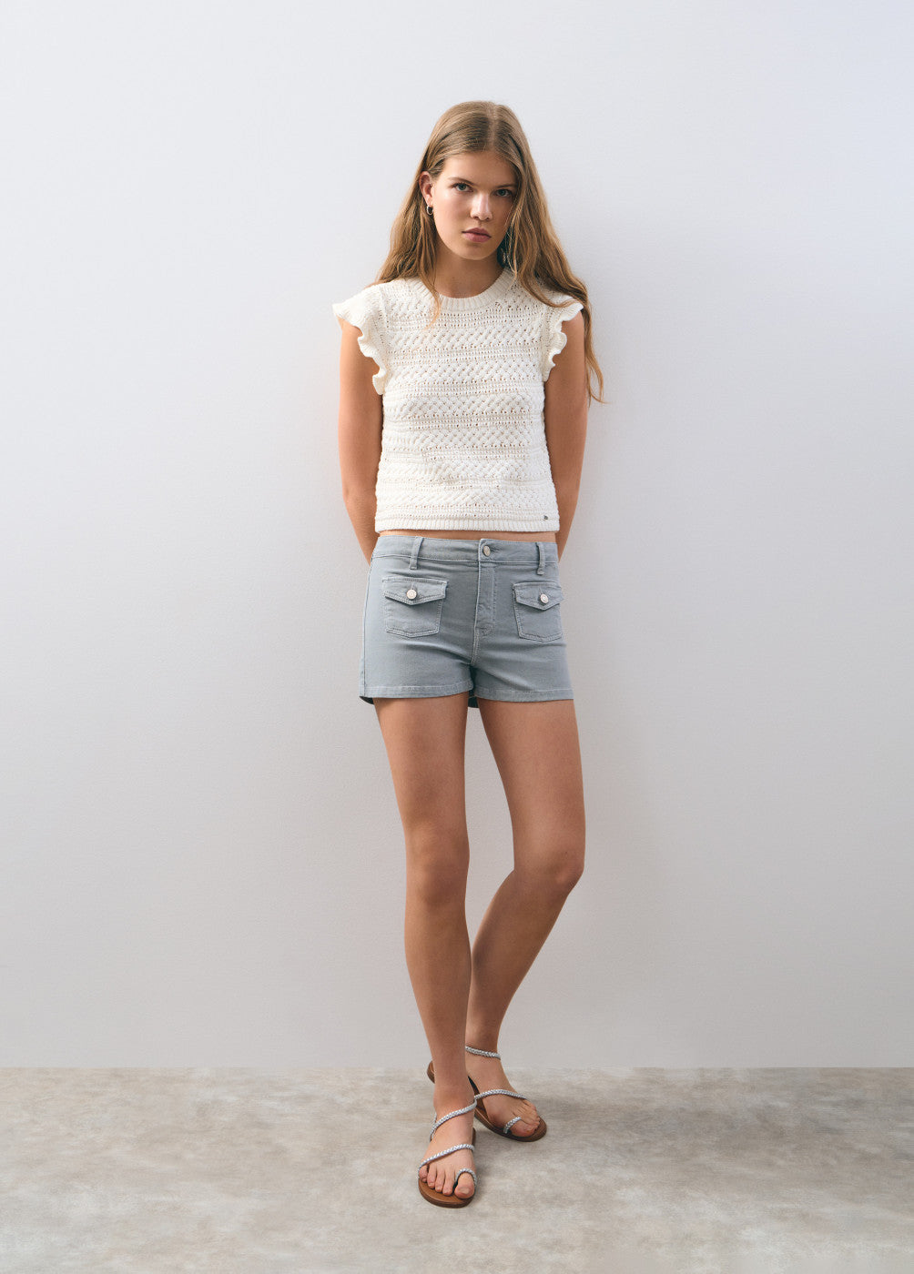 Short bolsillos frontales