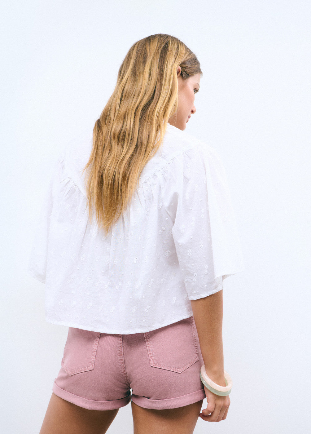 Blusa capa bordados