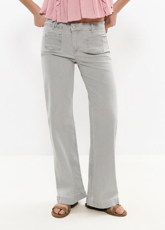 Jeans bolsillo parche estrella