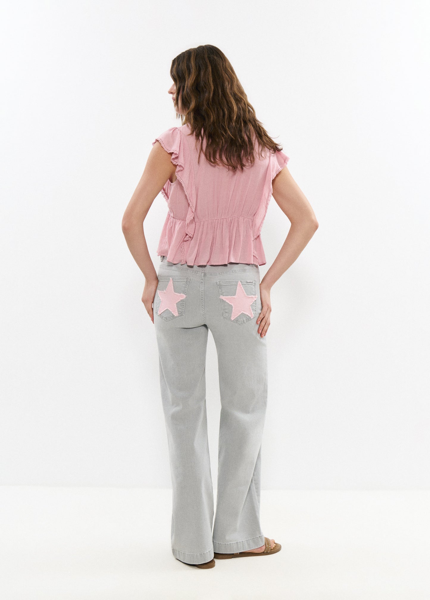 Jeans bolsillo parche estrella