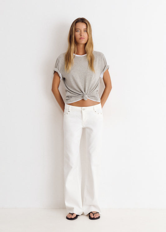Pantalón tiro bajo estrellas glitter y tachas