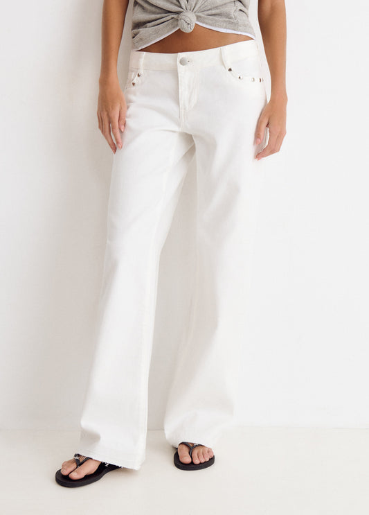 Pantalón tiro bajo estrellas glitter y tachas