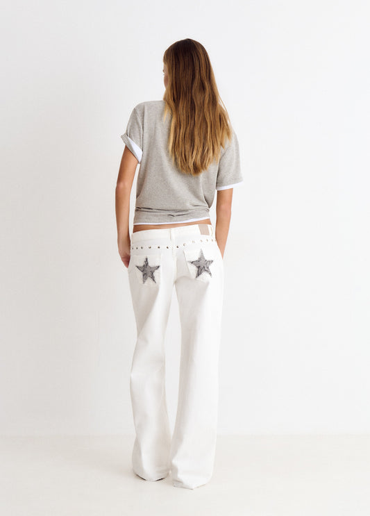 Pantalón tiro bajo estrellas glitter y tachas