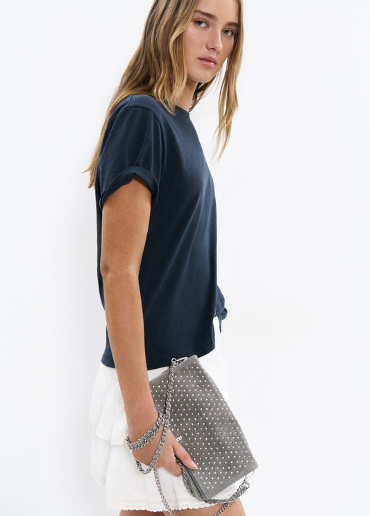 Bolso solapa tachitas cuero