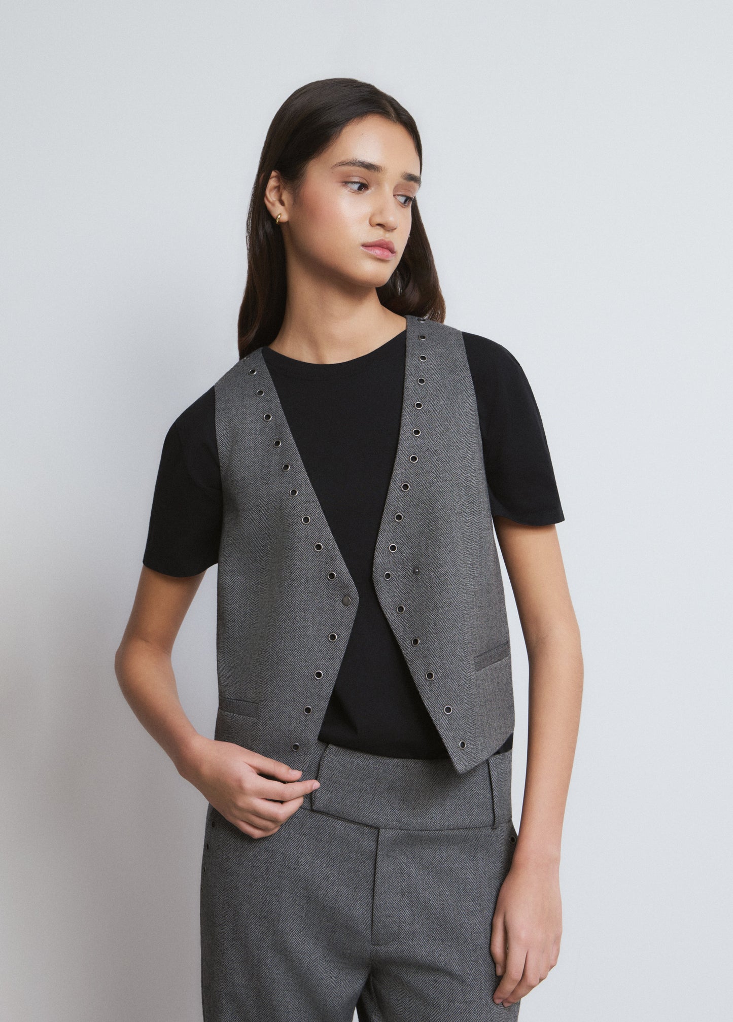 Chaleco cruzado eyelets