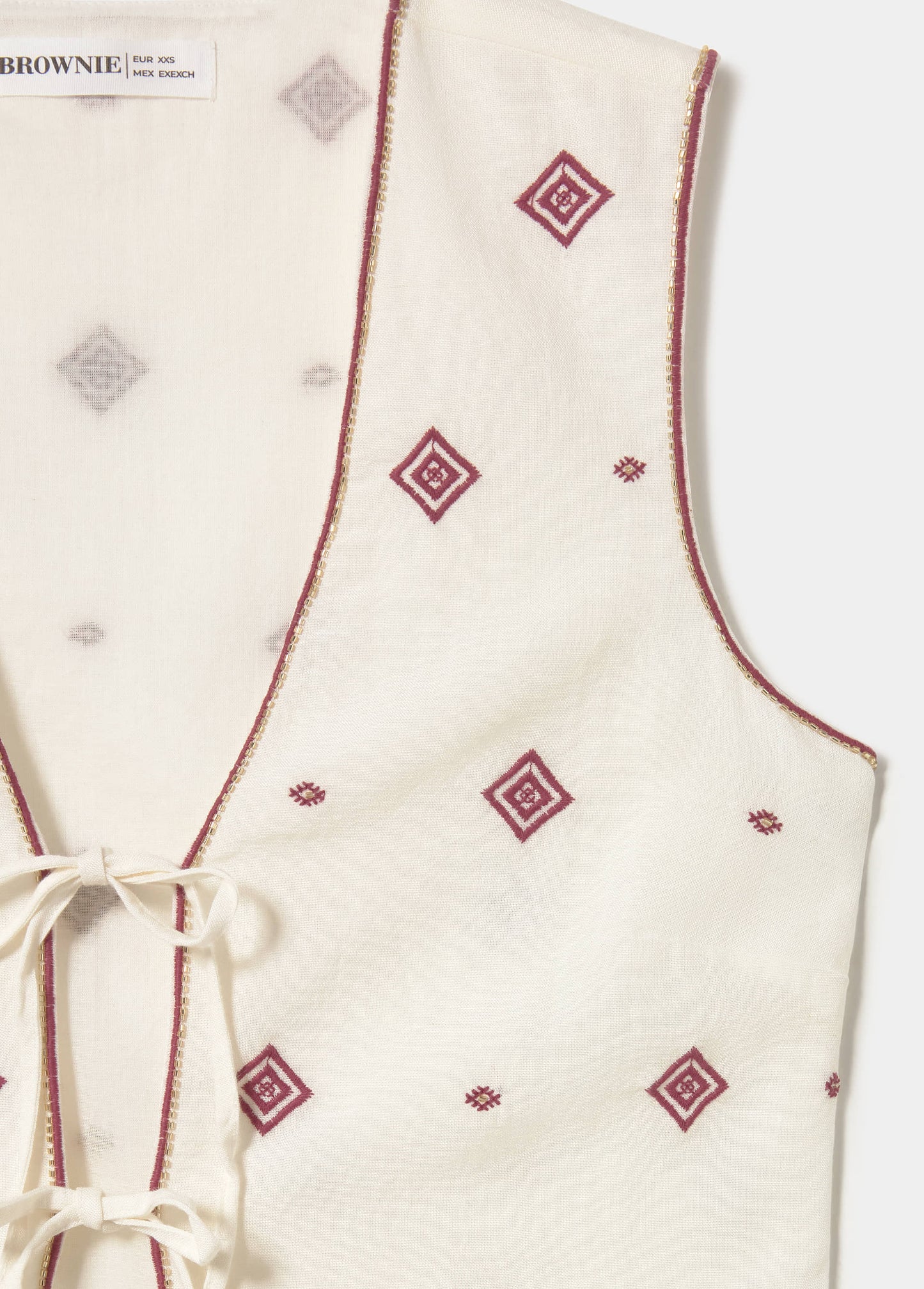 Chaleco bordado cenefa