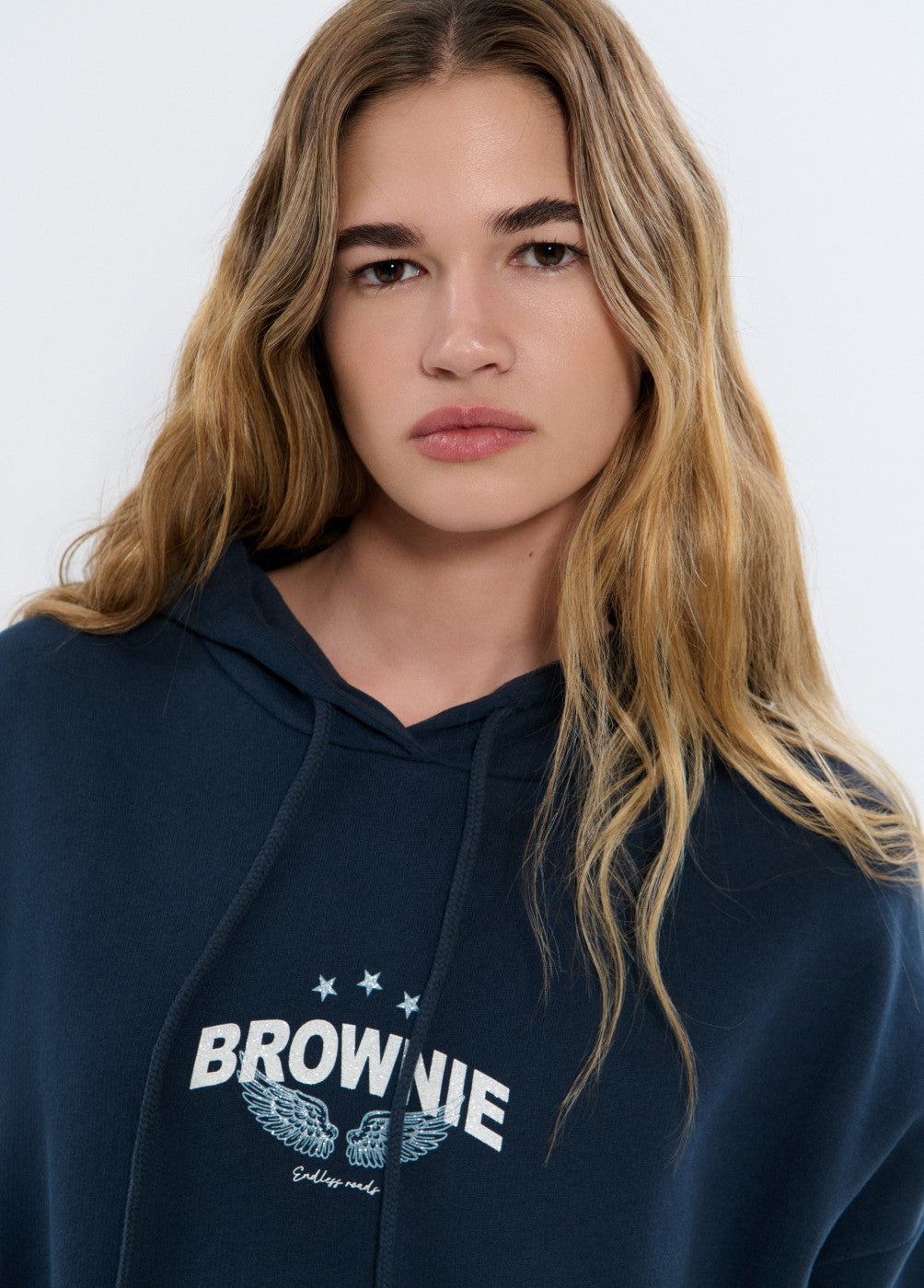 Sudadera capucha print alas