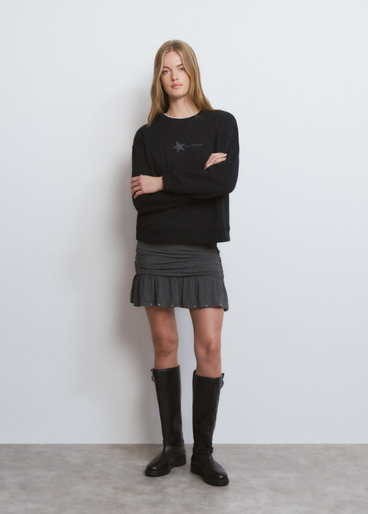 Falda corta pliegues