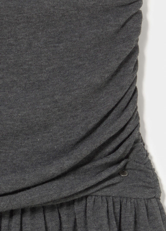 Falda corta pliegues