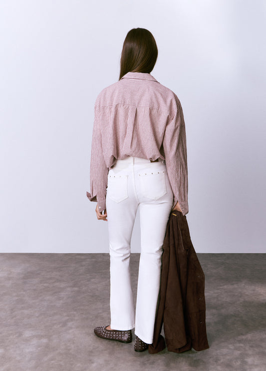 Jeans flare cropped tachas