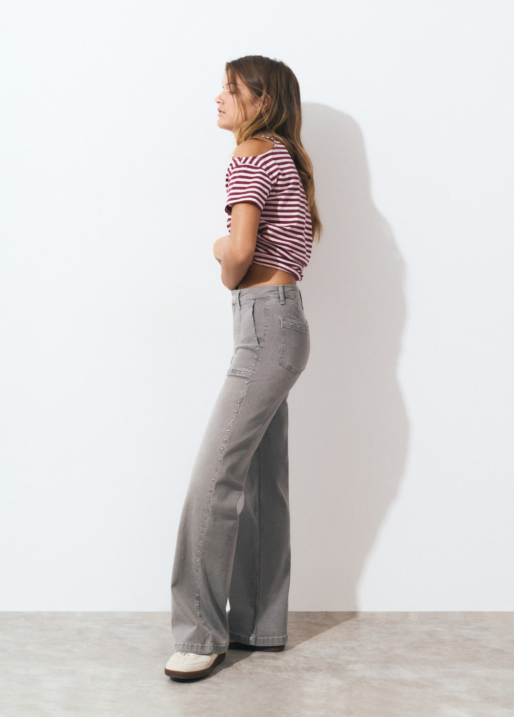 Jeans culotte tachas