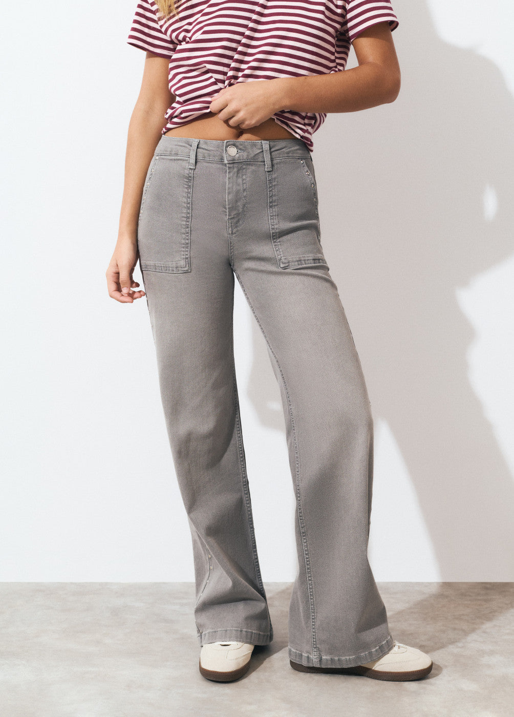 Jeans culotte tachas