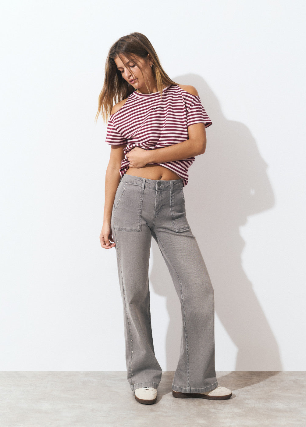 Jeans culotte tachas
