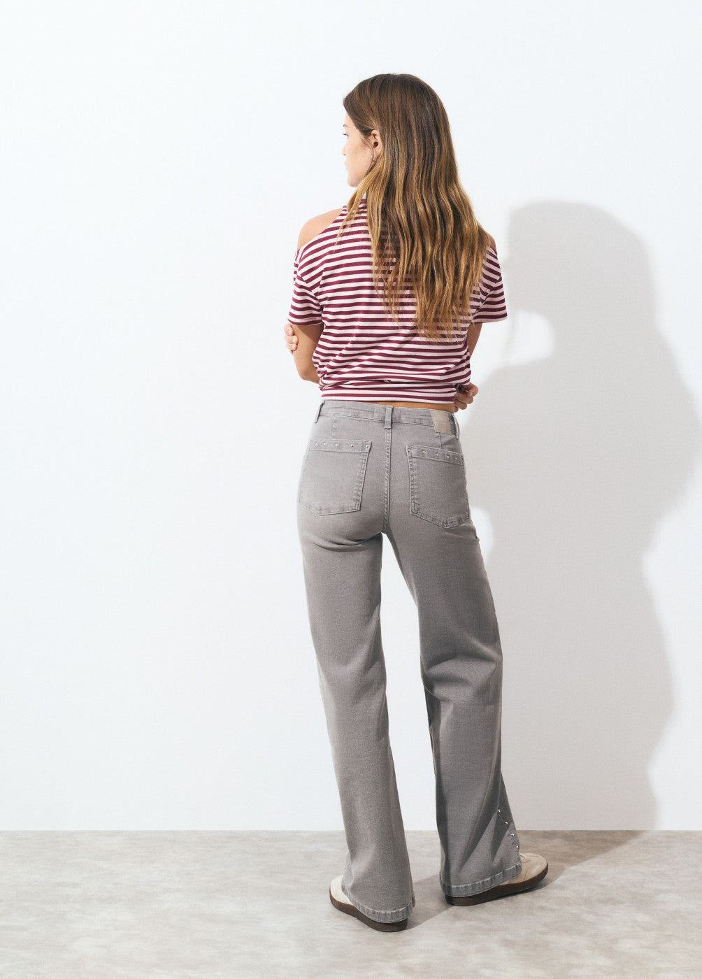 Jeans culotte tachas