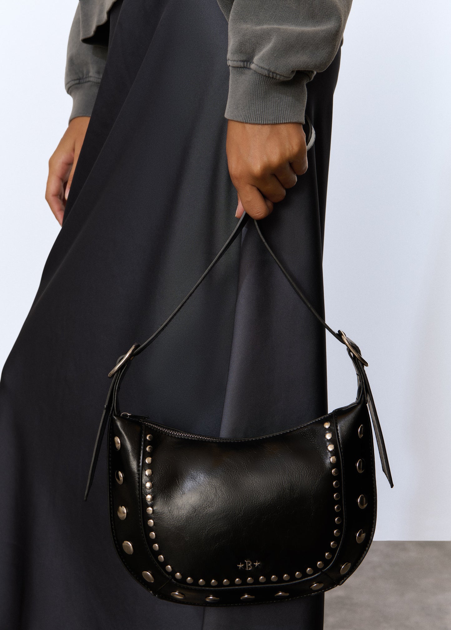 Bolso bandolera tachas