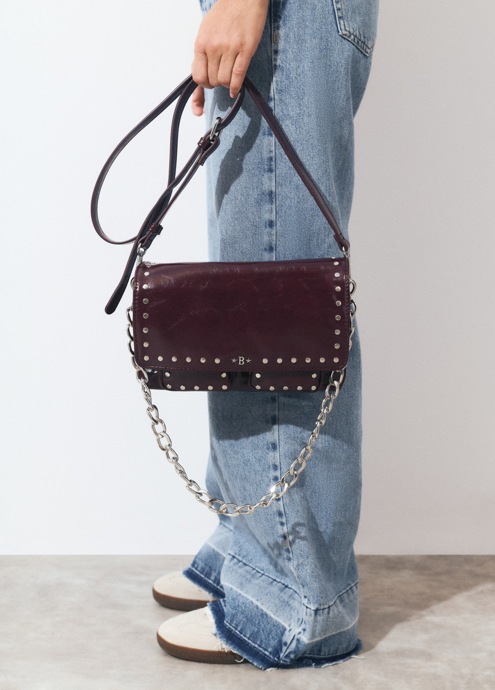 Bolso hombro tachas