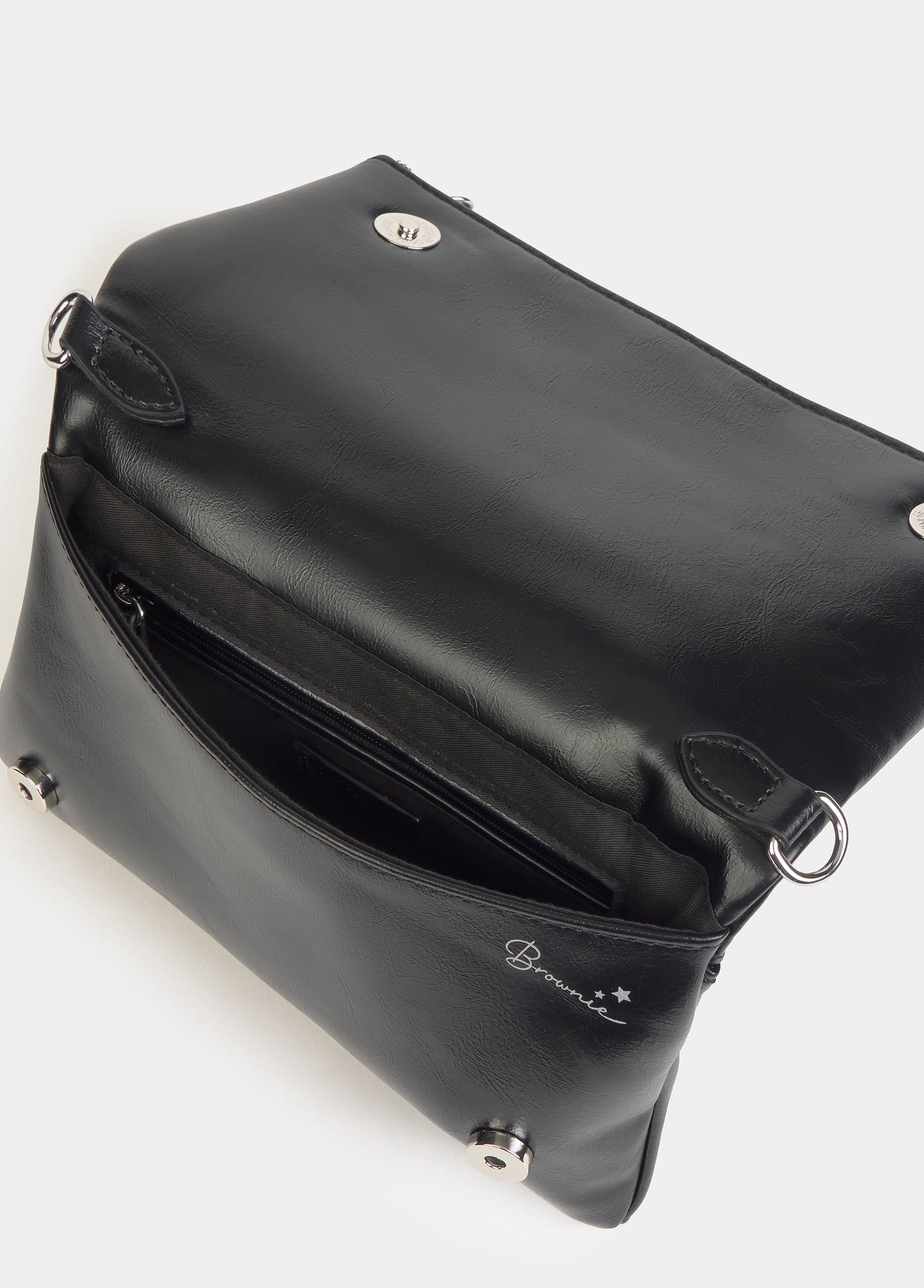 Bolso solapa tachas y estrellas