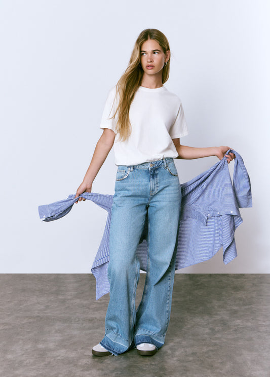 Jeans tachas bajo vuelta