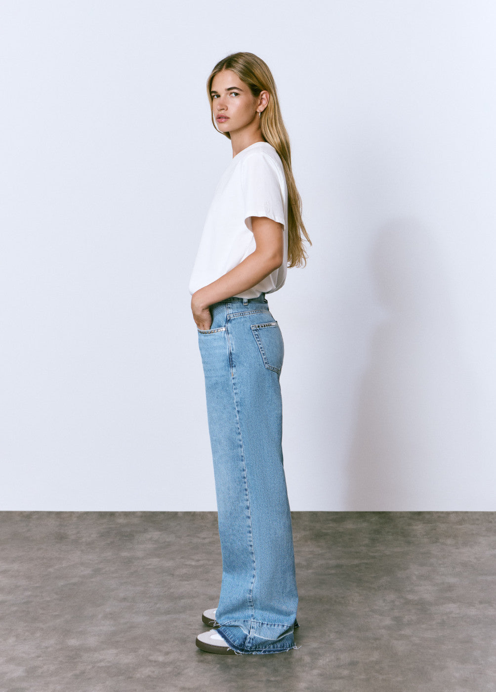 Jeans tachas bajo vuelta