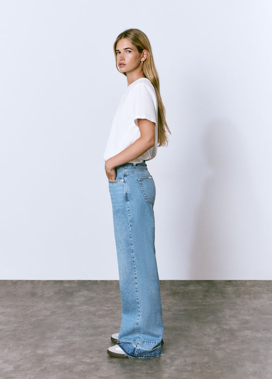 Jeans tachas bajo vuelta