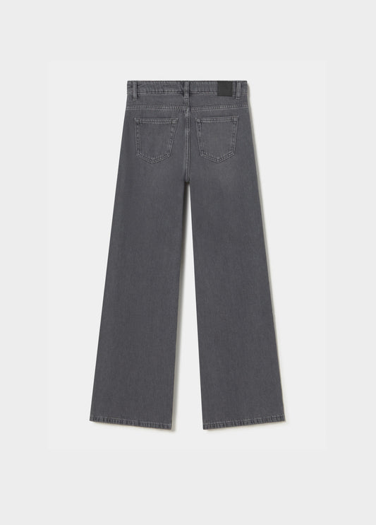 Jeans relaxed tachas lateral