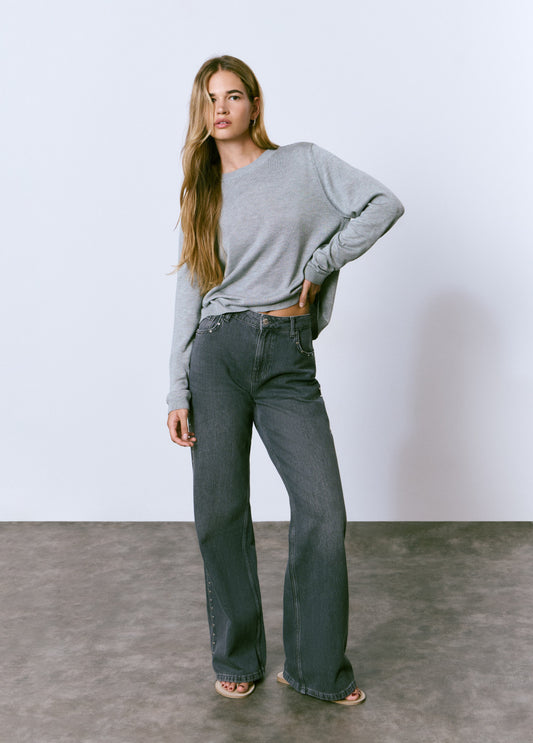 Jeans relaxed tachas lateral