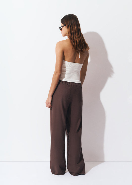 Pantalón fluido tachas