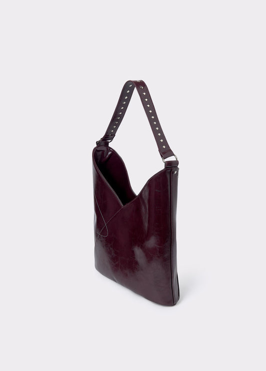 Bolso hombro tachitas