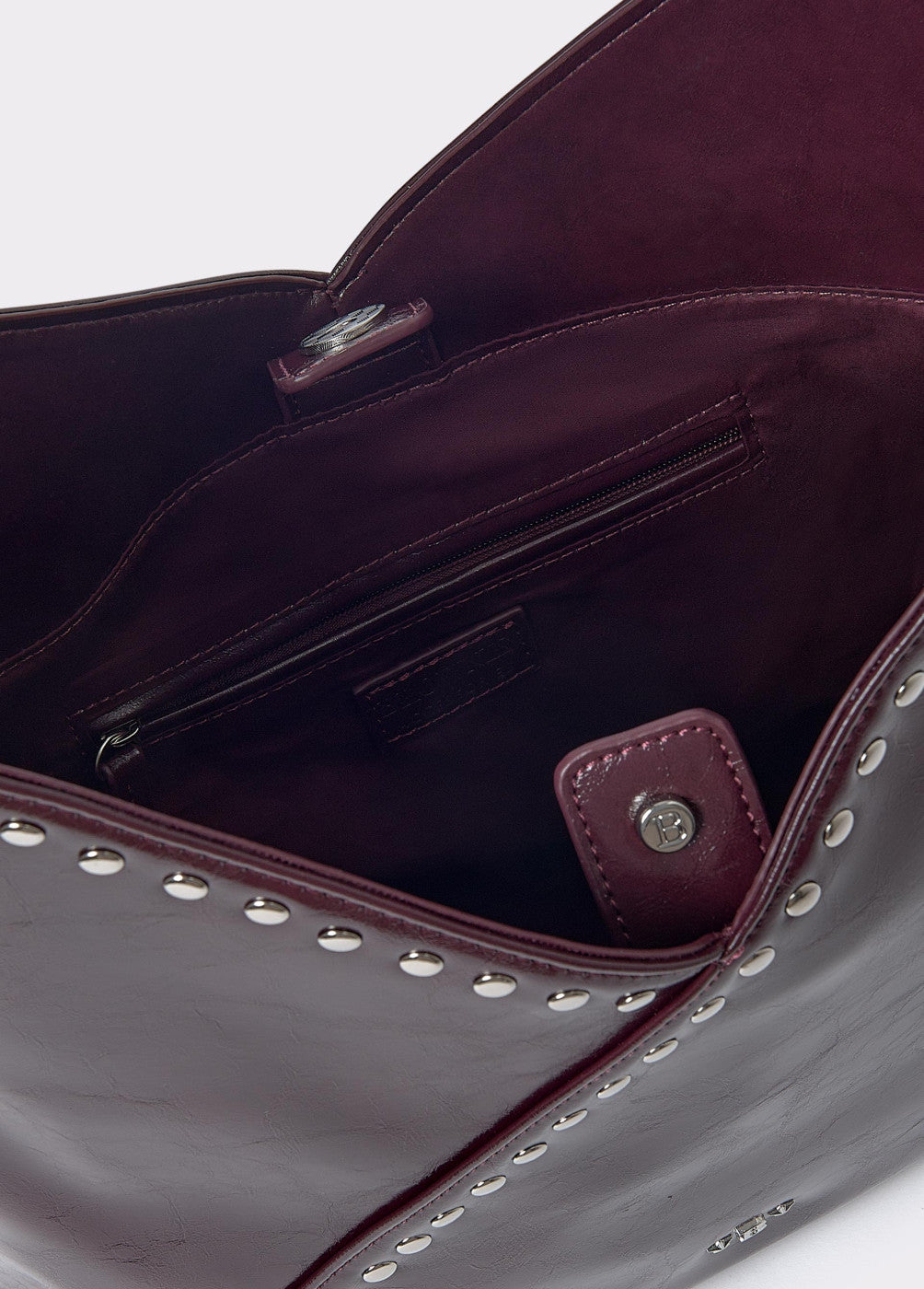 Bolso hombro tachitas
