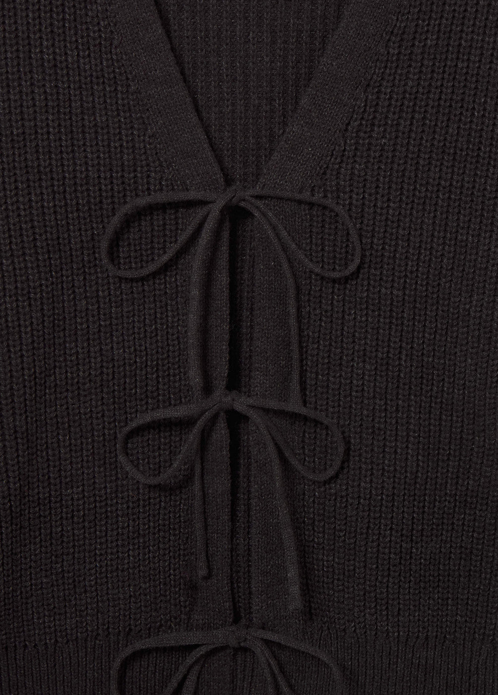 Chaqueta punto lazos