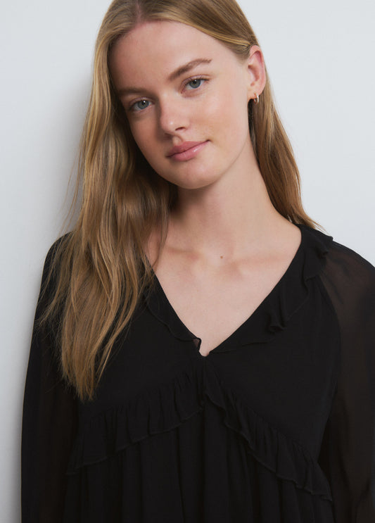 Blusa semitransparente eyelets