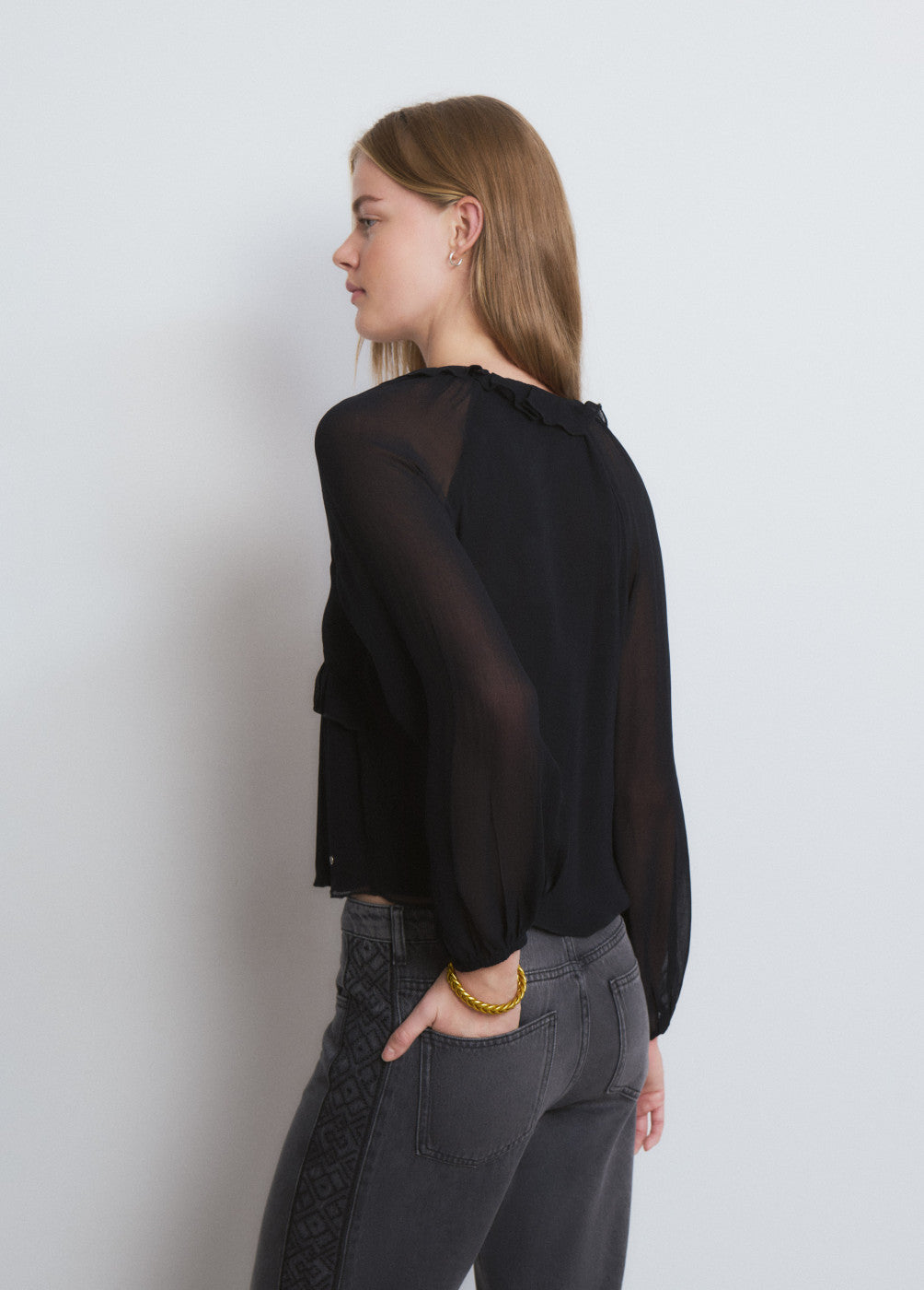 Blusa semitransparente eyelets