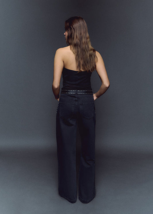 Jeans wideleg tachas