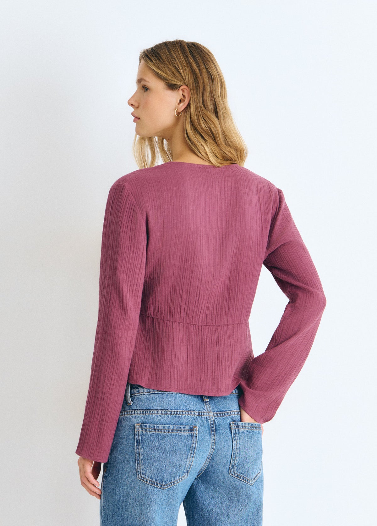 Blusa manga larga tachas