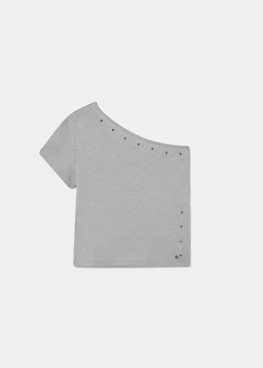 Camiseta asimetrica flor tacha