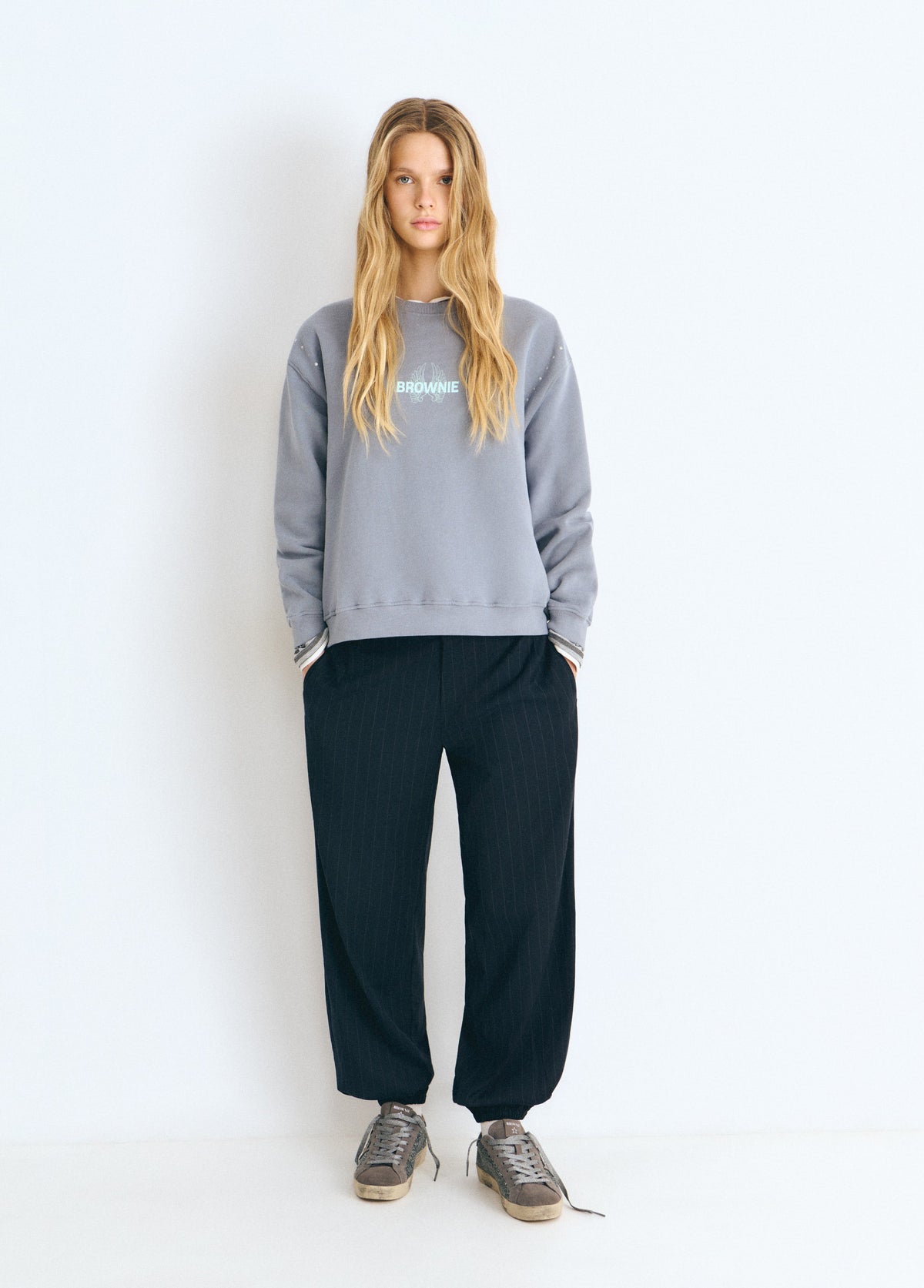 Sudadera print alas glitter