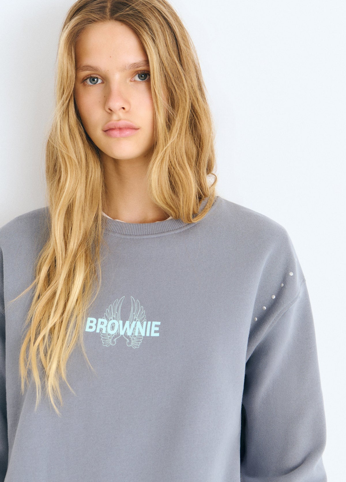 Sudadera print alas glitter
